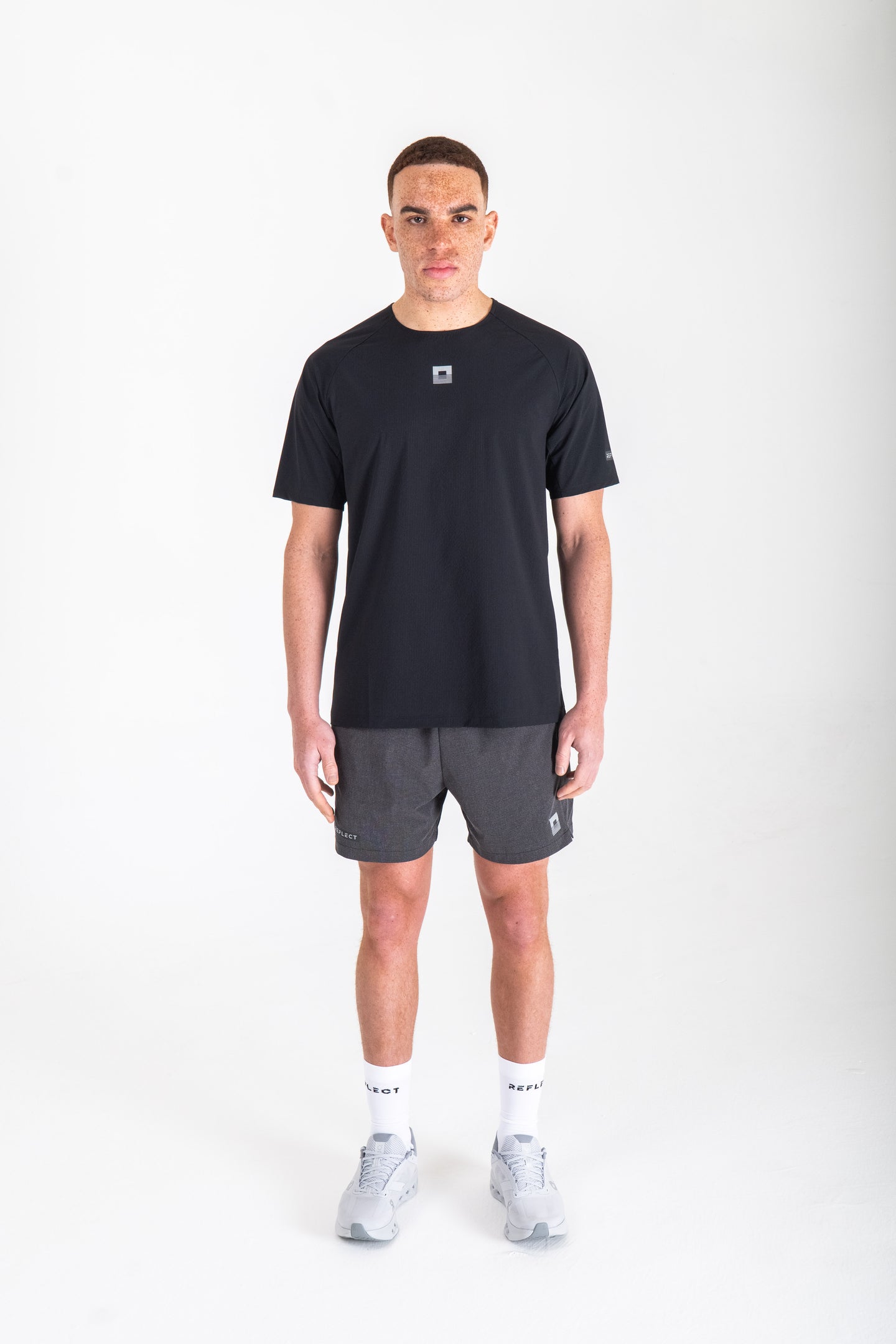 Men's Reflect® Mesh T-Shirt in Black — front view