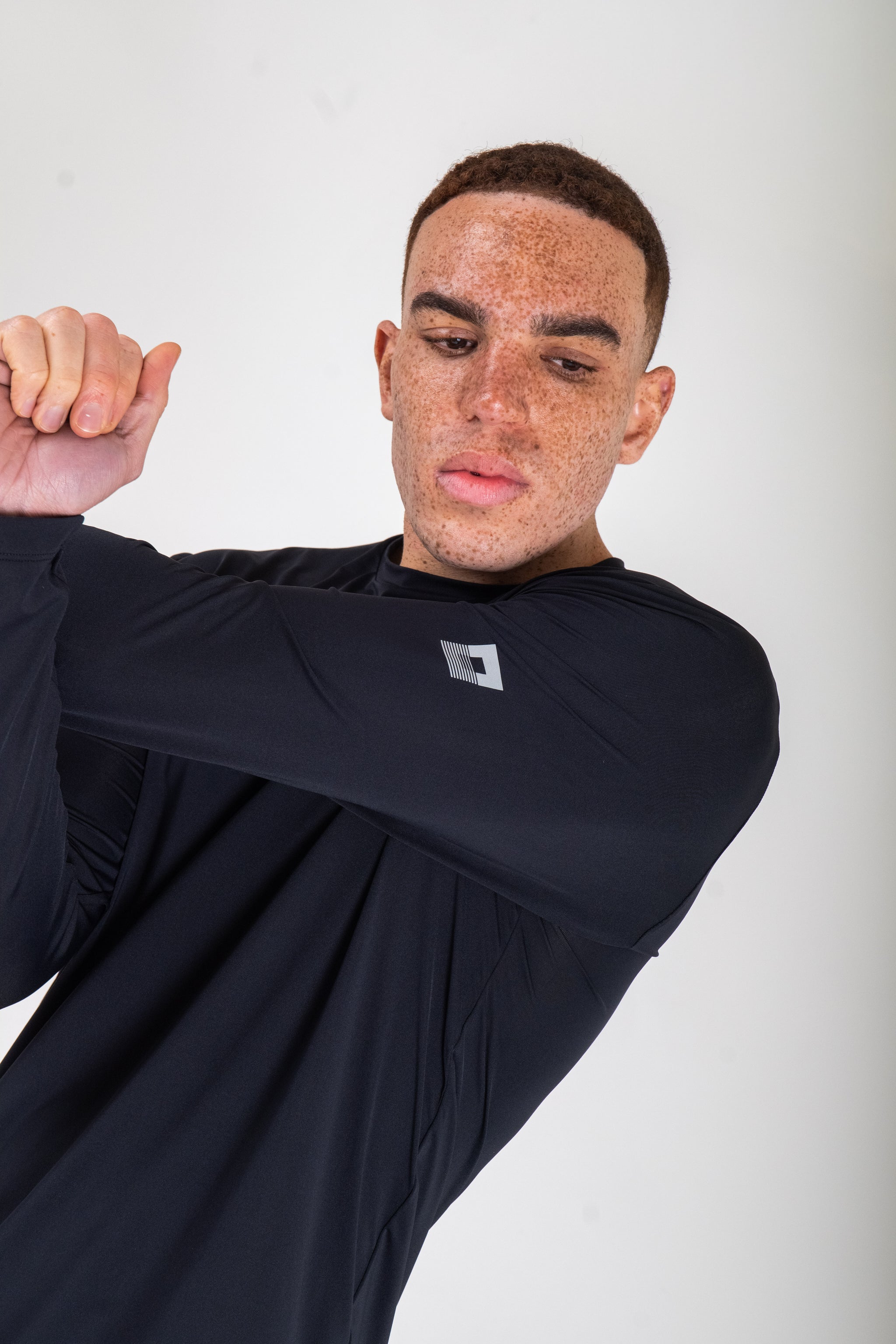 Reflect® Long Sleeve T-Shirt Navy — reflective branding detail