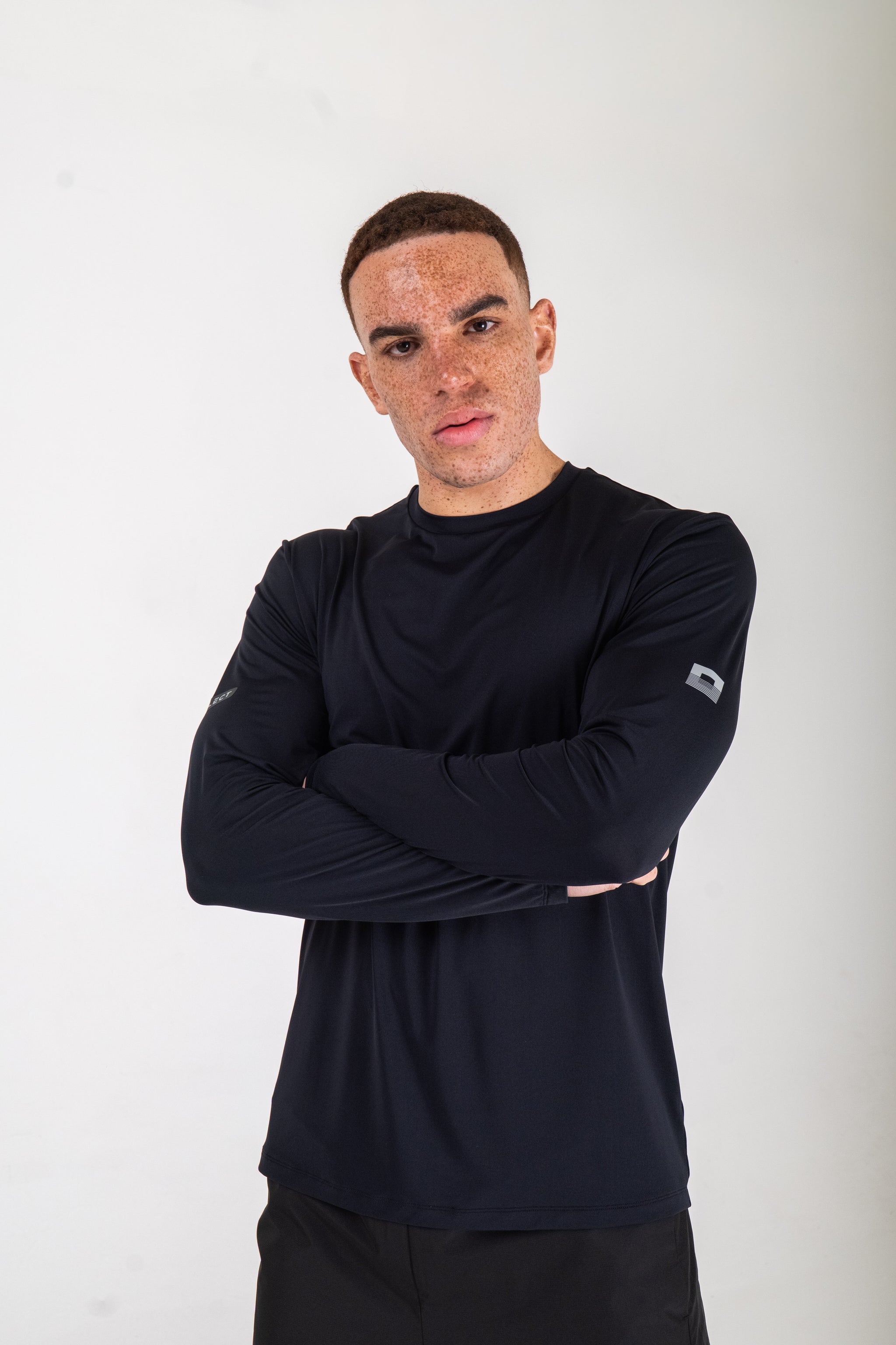 Reflect® Long Sleeve T-Shirt Navy — full lifestyle shot